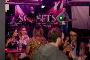 Live music at Scotts hotel Courtyard , people havign fun