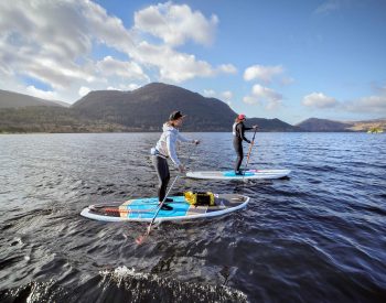 What's SUP... Oona Tibbetts, left and Beverley Gray, enjoying Stand Up Paddleboarding with Wild Sup Tours, on Muckross Lake, Killarney, as part of the Wander Wild Festival in Killarney National Park. The adventure and wellness festival continues until Sunday. Photo: Valerie O'Sullivan/FREE PIC***ISSUED 22/03/2024