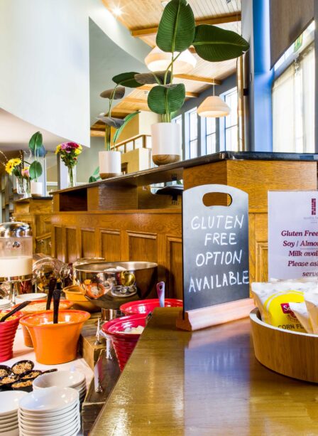Buffet breakfast with gluten-free options at Scotts Hotel Killarney, featuring fresh pastries and cereals.