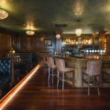 Elegant bar area at Scotts Hotel Killarney with plush seating and warm lighting.