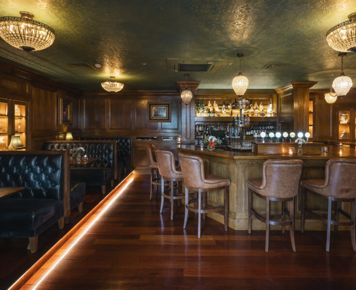 Elegant bar area at Scotts Hotel Killarney with plush seating and warm lighting.