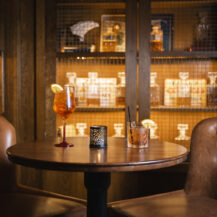 Cosy bar seating at Scotts Hotel Killarney with drinks and dim lighting creating a warm atmosphere.