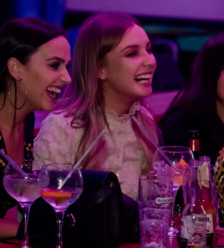 Four friends laughing and enjoying drinks at Scotts Hotel Killarney.