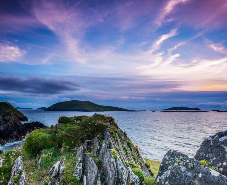 Scenic coastal view at sunset with vibrant skies near Scotts Hotel Killarney.