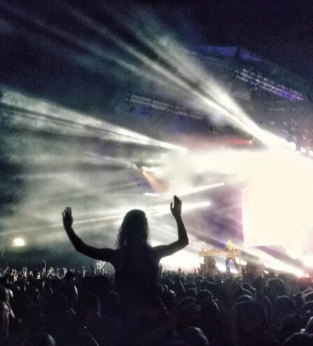 Crowd enjoys lively night concert with vibrant lights at Scotts Hotel Killarney.