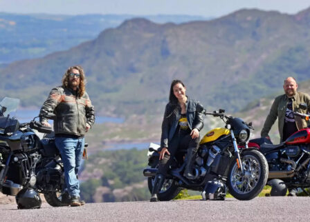 Three people on motorcycles enjoying a scenic mountain view near Scotts Hotel Killarney.