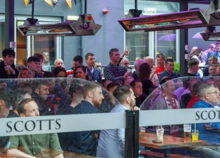 People enjoying a lively event at Scotts Hotel Killarney outdoor area.